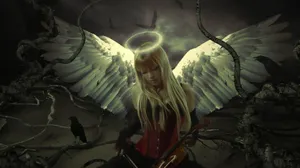 A Serene Angel With Majestic Wings Wallpaper