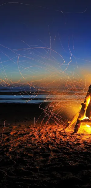 A Serene Beach Camping Experience Wallpaper