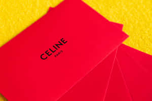 A Shiny Red Envelope On A Wooden Table Wallpaper