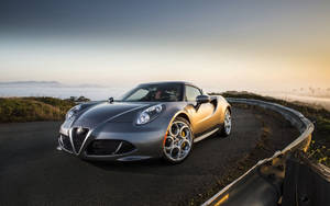 A Silver Alfa Romeo 4c At The Starting Line Wallpaper