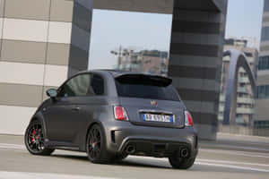 A Sleek Abarth 695 In All Its Elegance. Wallpaper