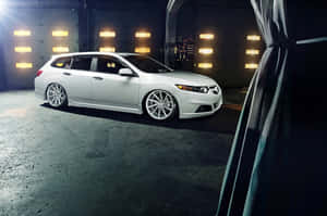 A Sleek Acura Tsx In An Urban Setting Wallpaper