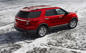 A Sleek And Powerful Ford Explorer On The Road Wallpaper