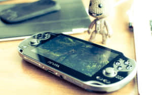 A Sleek Black Ps Vita In High Definition Wallpaper