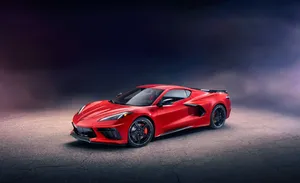 A Sleek Chevrolet Corvette Stingray In Stunning Red Wallpaper