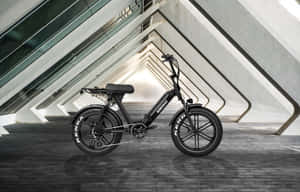 A Sleek Electric Bike On A Scenic Trail Wallpaper