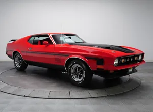 A Sleek Ford Mustang Mach 1 In Its Full Glory Wallpaper