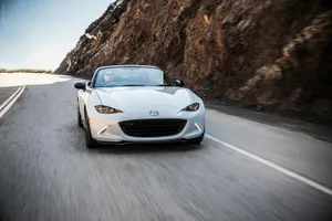 A Sleek Mazda Mx-5 Miata Brilliance On The Open Road Wallpaper