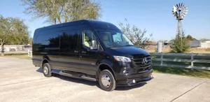 A Sleek Mercedes Benz Sprinter On The Road Wallpaper