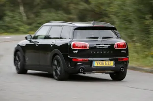 A Sleek Mini Cooper S Clubman All4 In Action Wallpaper