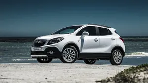 A Sleek Opel Mokka On The Road Wallpaper