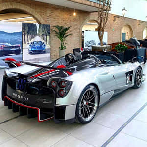 A Sleek Pagani Zonda C12 Roadster Parked In The Sun Wallpaper