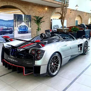 A Sleek Pagani Zonda C12 Roadster Parked In The Sun Wallpaper