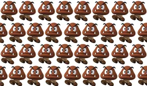 A Smiling Goomba From Super Mario Games Wallpaper