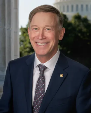 A Smiling John Hickenlooper On Phone Wallpaper