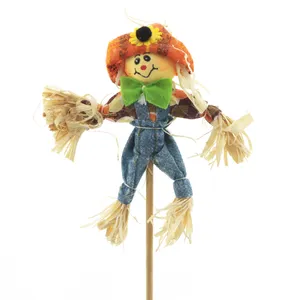 A Smiling Scarecrow Ready For Fall Wallpaper