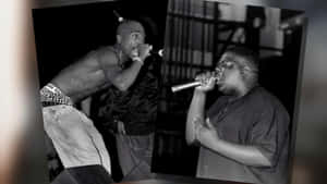 A Snapshot Of Two Music Legends, Tupac And Biggie. Wallpaper