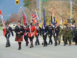 A Solemn Moment Of Reflection On Remembrance Day In Canada Wallpaper