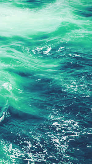 A Soothing Seafoam Green Wallpaper That Brings Tranquility To Any Space Wallpaper