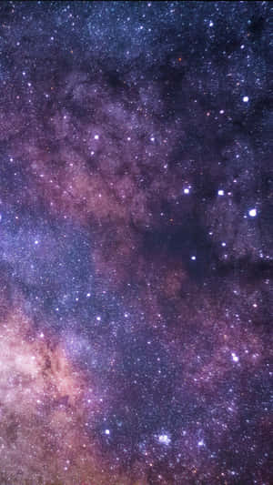 A Space With Stars And Milky Wallpaper