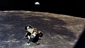 A Spacecraft Journeying Into The Cosmos Wallpaper