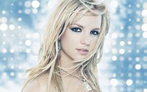 A Sparkling Britney Spears Glows In Blue Wallpaper