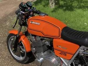 A Sparkling Laverda Motorcycle On The Open Road. Wallpaper