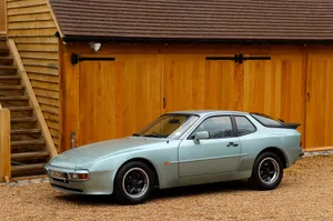 A Spectacular Porsche 944 In Motion Wallpaper