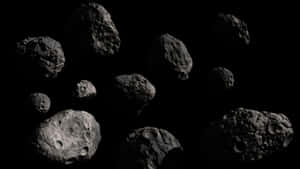 A Spectacular View Of An Asteroid Approaching Earth Wallpaper