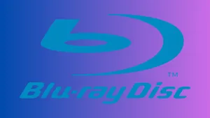 A Stack Of 4k Blu-ray Discs With Cinema Background Wallpaper