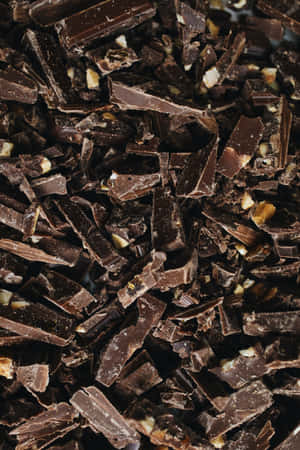 A Stack Of Delicious Dark Chocolate Wallpaper