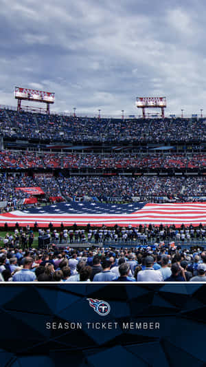 A Stadium With A Large American Flag Wallpaper