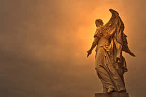 A Statue Of An Angel With Wings In The Sky Wallpaper