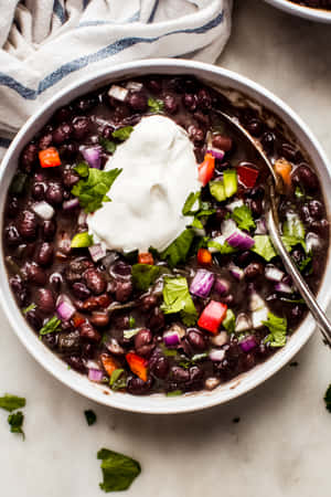 A Steaming And Savory Bowl Of Black Bean Soup Wallpaper