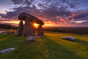 A Stone Circle In The Grass Wallpaper