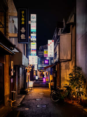 A Street With A Bike Parked In It Wallpaper