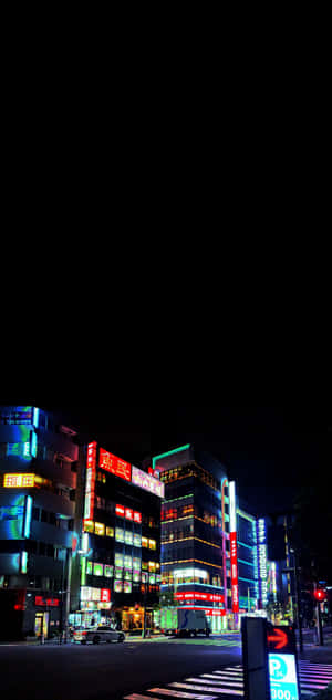 A Street With Buildings And A Street Light Wallpaper