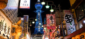 A Street With Many Signs And Lights Wallpaper