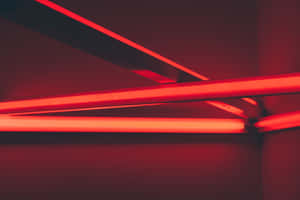 A Striking Red Led Light Wallpaper