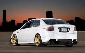 A Stunning Acura Tl Showcasing Its Sleek Design And Superior Performance In A Captivating Outdoor Setting. Wallpaper