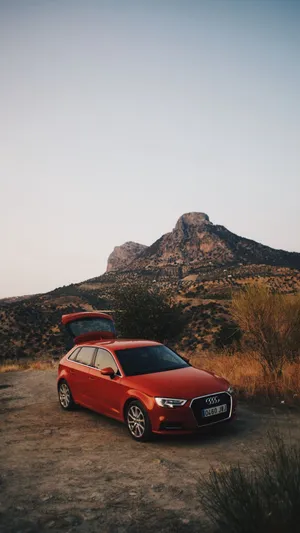 A Stunning Audi Q5 With Blue Sky Background Wallpaper