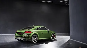 A Stunning Audi Tt Rs In Motion Wallpaper