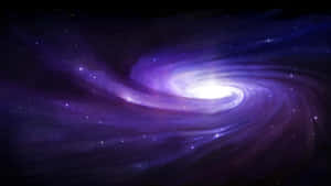 A Stunning Black And Purple Galaxy Wallpaper