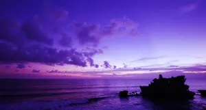 A Stunning Blue And Purple Sunset Wallpaper