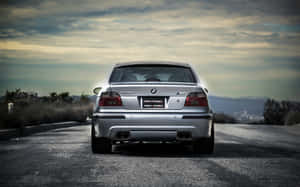 A Stunning Bmw M5 In Motion On The Open Road Wallpaper
