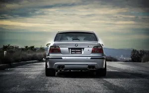 A Stunning Bmw M5 In Motion On The Open Road Wallpaper