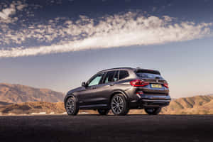 A Stunning Bmw X3 Showcasing Its Sleek Design And Power Wallpaper