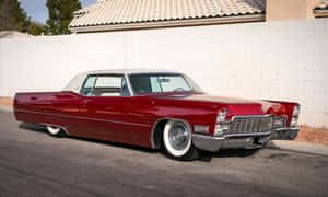 A Stunning Cadillac Deville Wallpaper With Vibrant Colors Wallpaper