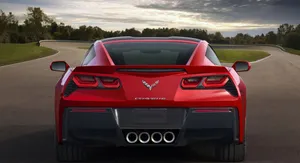 A Stunning Chevrolet Corvette Stingray On The Open Road Wallpaper