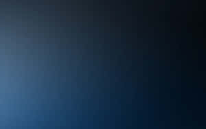 A Stunning Dark Blue Gradient Wallpaper Wallpaper